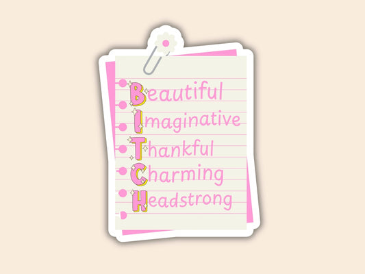 A die-cut sticker designed to look like a lined notepad page clipped at the top, featuring the word 'BITCH' spelled vertically in pink letters with decorative pink and yellow lettering accents. The sticker is shown on a solid pale beige background.