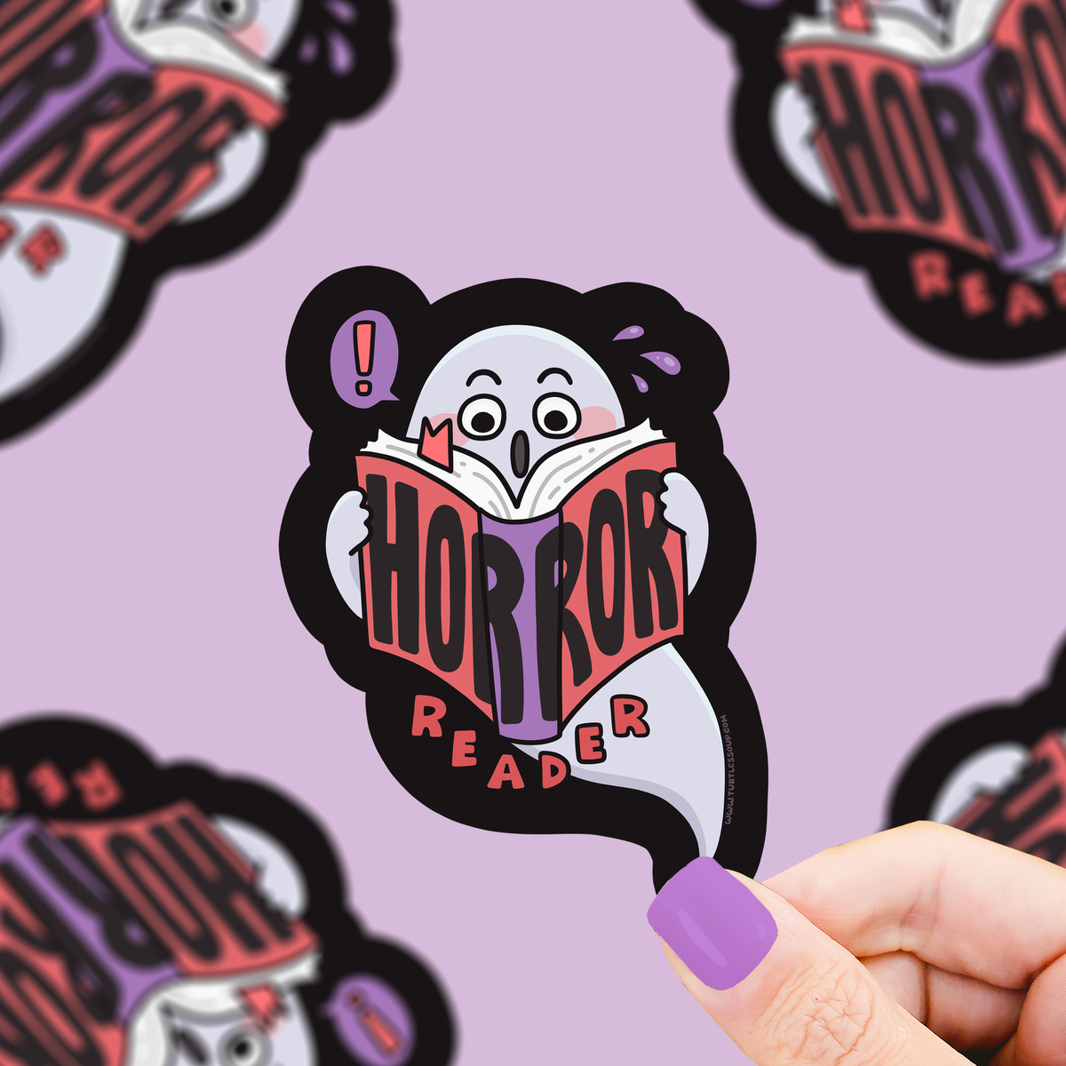 Sticker of a ghost reading 'Horror Reader' on a purple background with multiple stickers.
