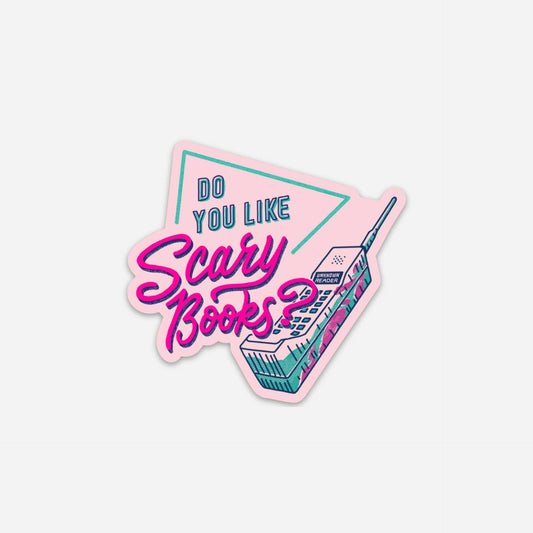 A die-cut sticker featuring retro-style pink and teal text that reads 'DO YOU LIKE Scary Books?' with an illustration of a vintage mobile phone, shown on a light gray background.