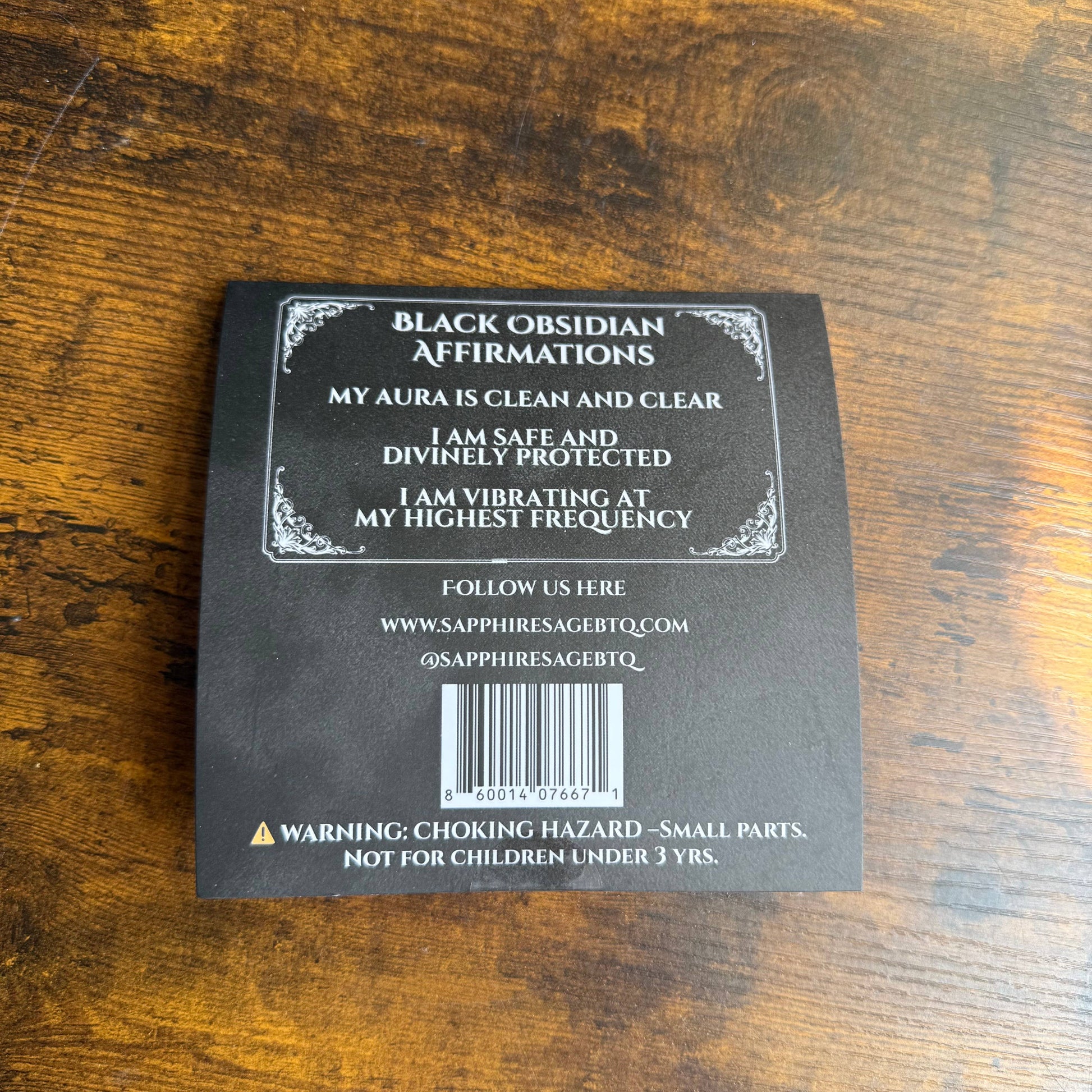 Black Obsidian Affirmations packaging on a wooden surface