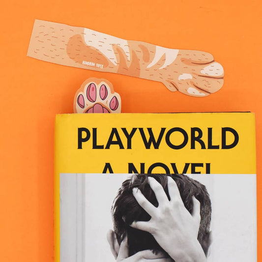 Book titled 'Playworld' with a paw print and bandage on an orange background