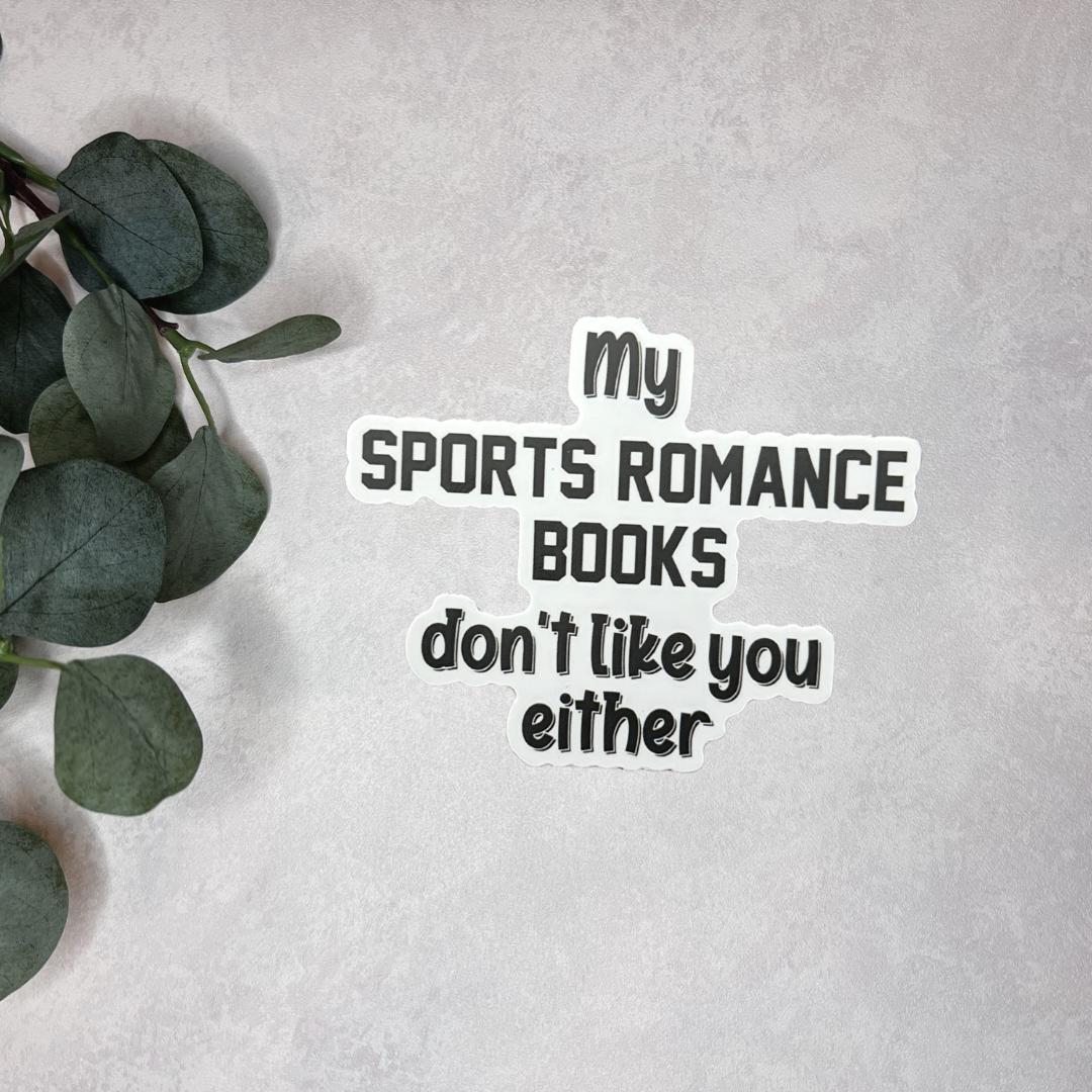 Text 'My sports romance books don't like you either' on a light gray background with green leaves.