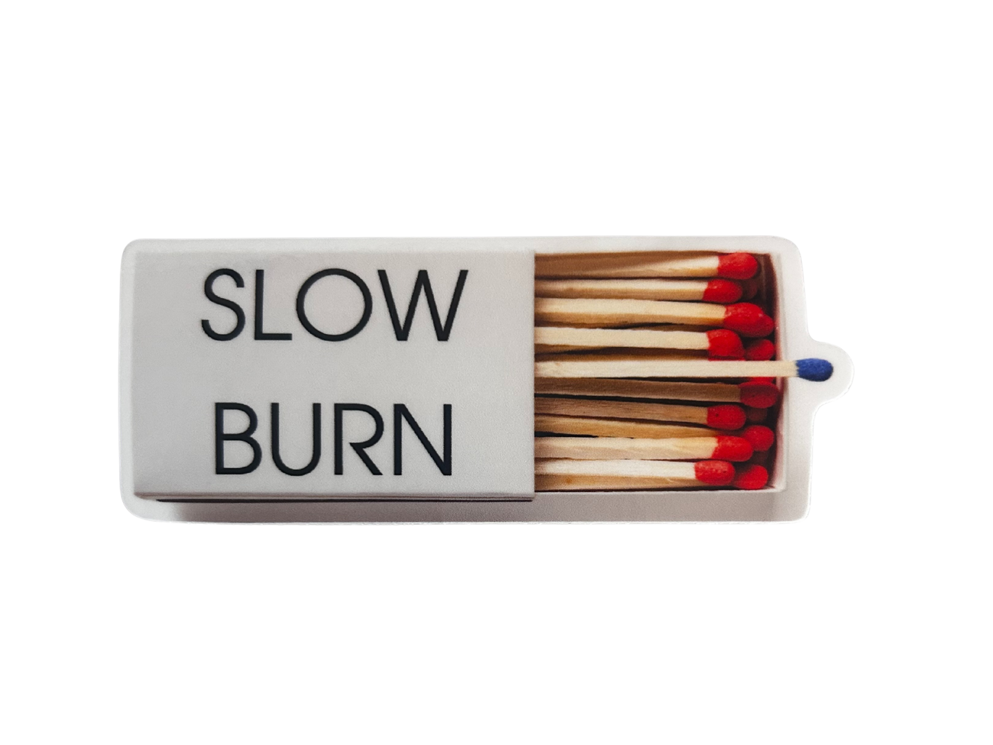 Matchbox with 'SLOW BURN' text and matches inside on a white background