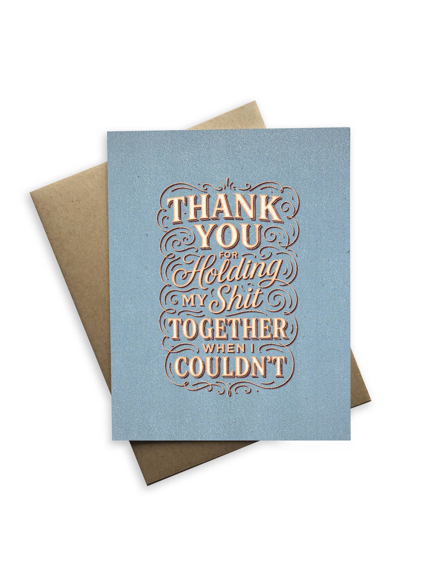 Card with text 'Thank you for holding my shit together when I couldn't' on a blue background with a brown envelope.