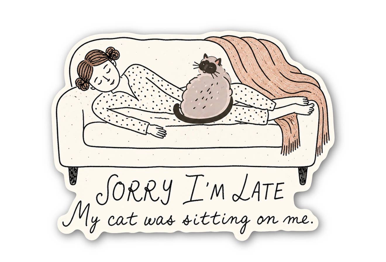 Sticker with a cartoon of a person lying on a couch with a cat sitting on them, and text 'Sorry I'm late. My cat was sitting on me.