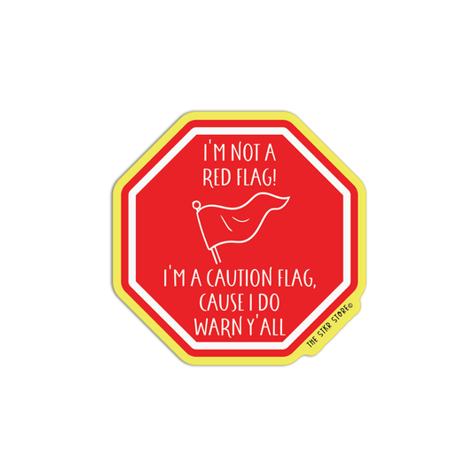 A red octagonal sticker with a yellow border and white text that reads, 'I'M NOT A RED FLAG! I'M A CAUTION FLAG, CAUSE I DO WARN 'Y'ALL' with a small white flag illustration. The brand name 'THE SIDE STICK' is visible in small text along the bottom right edge.