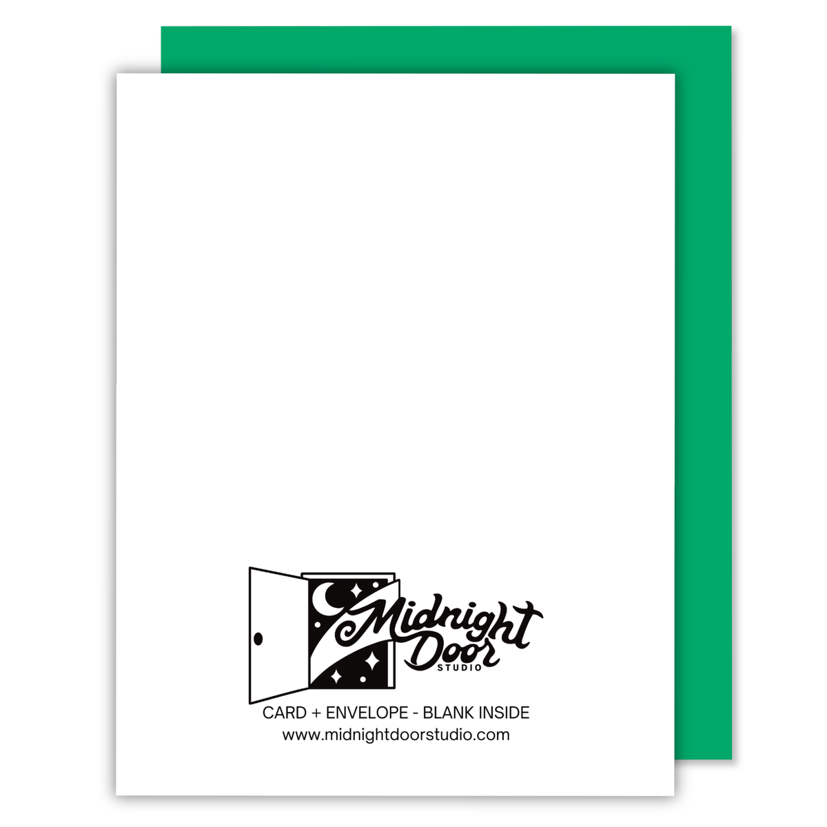 A white card with a black Midnight Door Studio logo printed near the bottom, shown with a green envelope behind it on a white background.