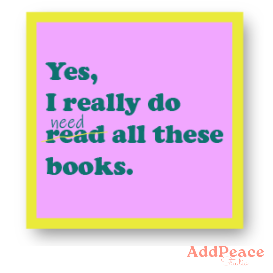 Framed quote on a pink background with a yellow border, featuring the text 'Yes, I really do need all these books.'