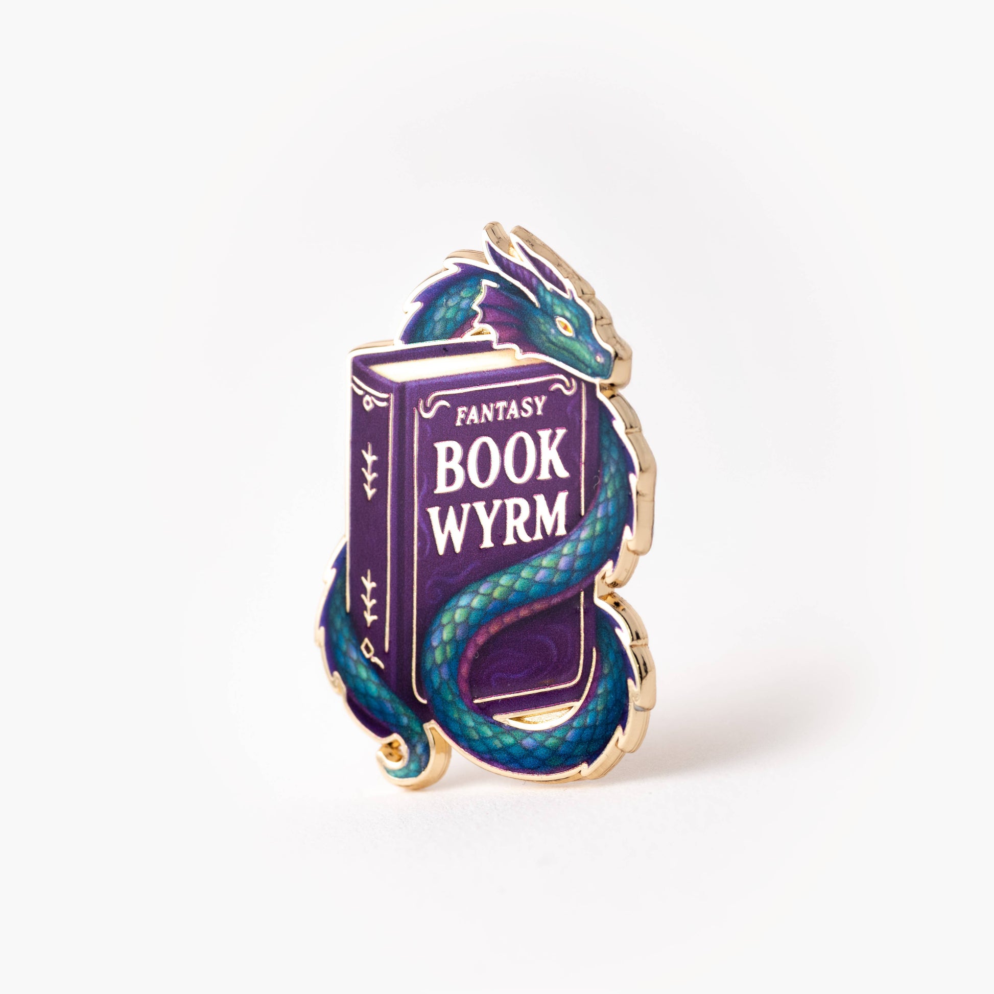 Fantasy 'Book Wyrm' pin with a dragon design on a white background