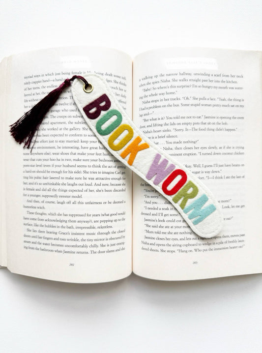 Colorful 'BOOKWORM' bookmark on an open book