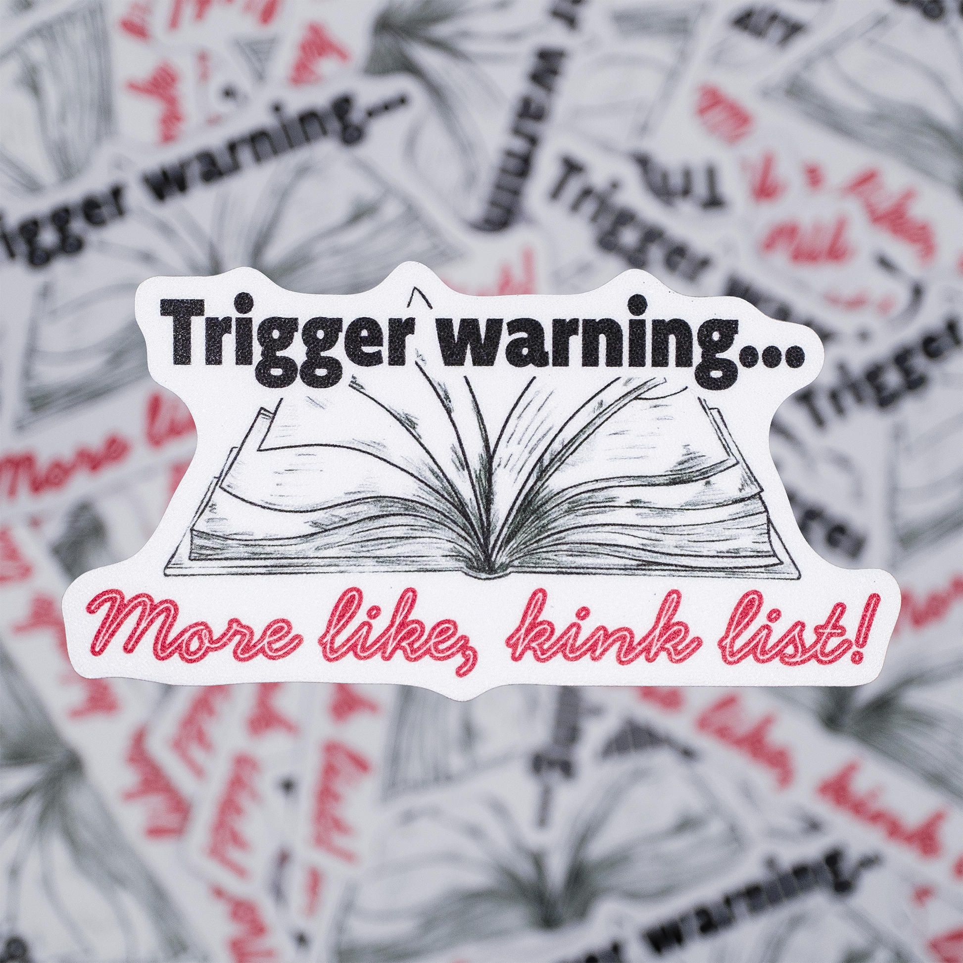 Sticker with 'Trigger warning... More like, kink list!' text on a background of similar stickers.