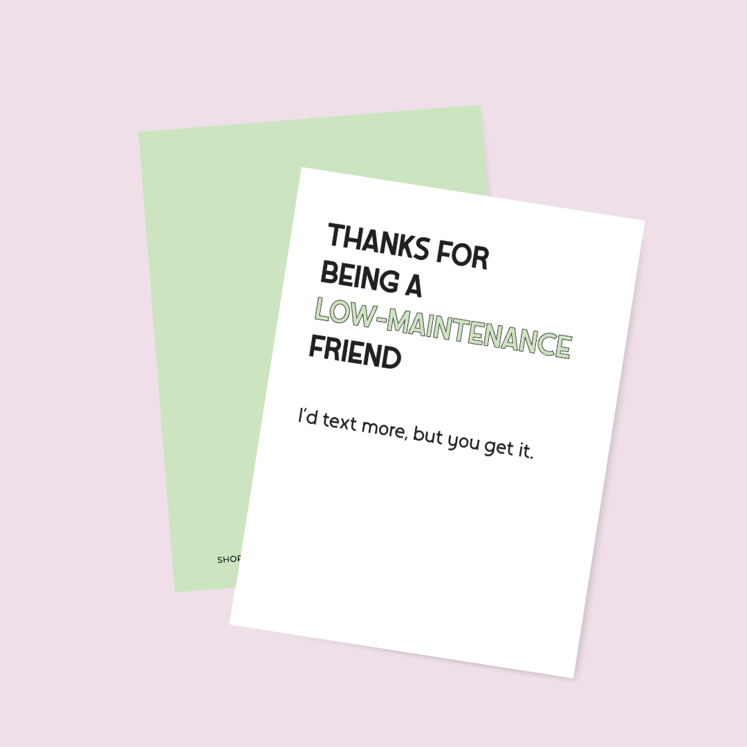 Greeting card with humorous text on a light pink background