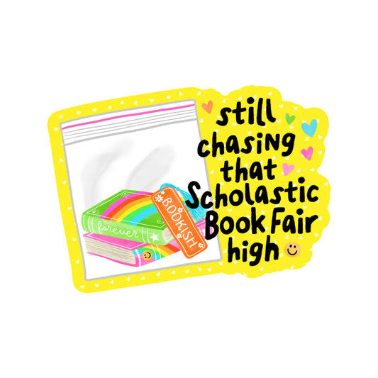 Packaging with books and a rainbow design, featuring text 'still chasing that Scholastic Book Fair high' on a yellow background.