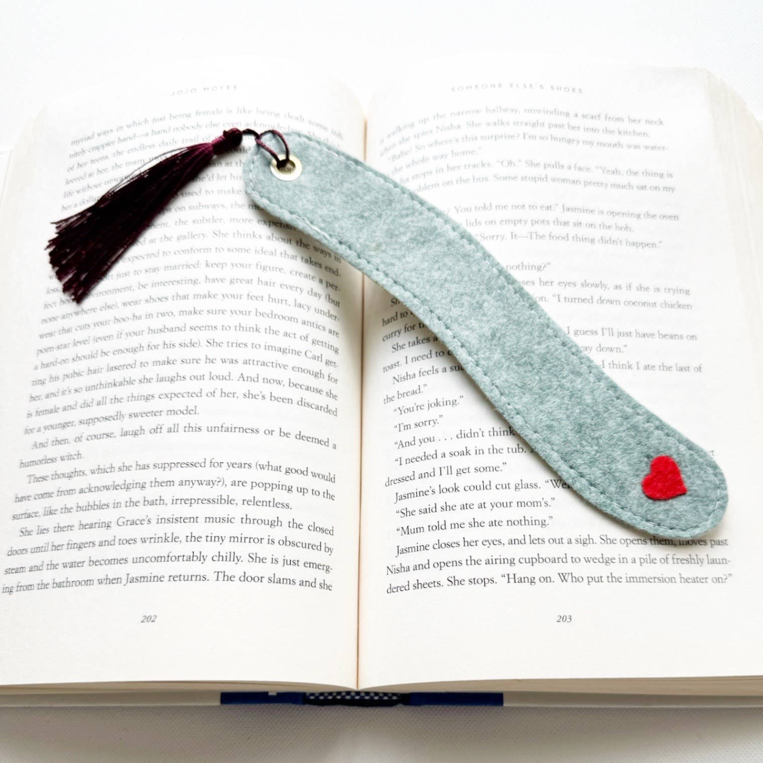 Felt bookmark with a red heart on an open book