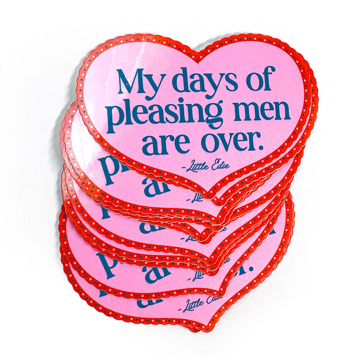 Stack of heart-shaped pink coasters with blue text on a white background