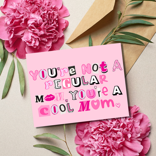 Pink card with text 'You're not a regular mom, you're a cool mom' surrounded by pink flowers and green leaves on a beige background.