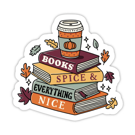 A die-cut sticker featuring a stack of four books with autumn-themed illustrations, including a coffee cup, leaves, and stars. The books are labeled 'BOOKS', 'SPICE &', 'EVERYTHING', and 'NICE'.