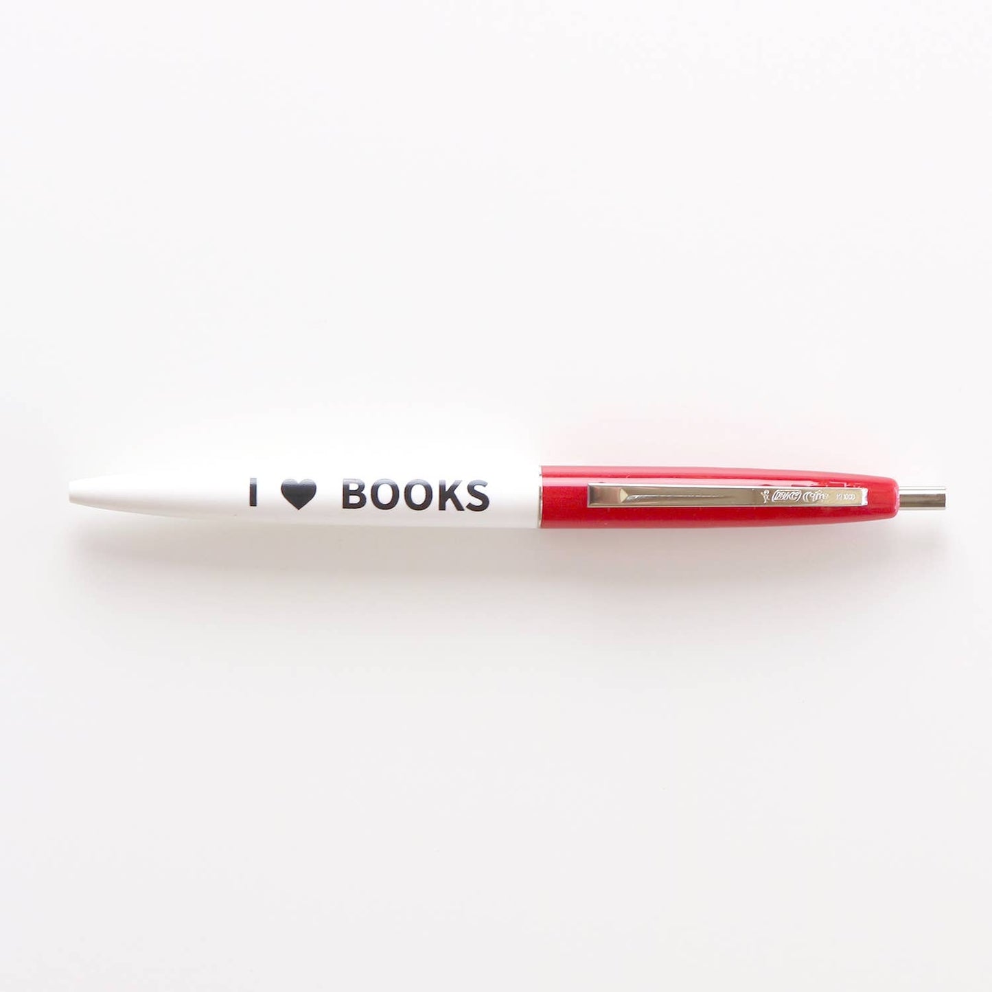 Pen with 'I ❤️ BOOKS' text on a white background